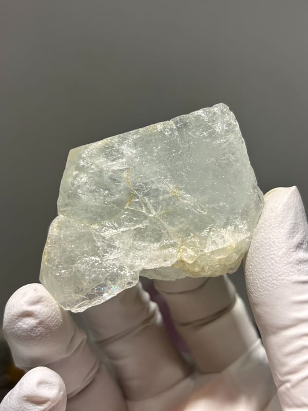 Frosted pale green aquamarine tablet from Xuebaoding, Sichuan, China, close-up of the crystal faces
