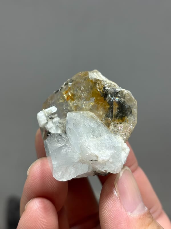 Yellow gel-flower aquamarine with mica and feldspar from Sichuan, China, reverse side