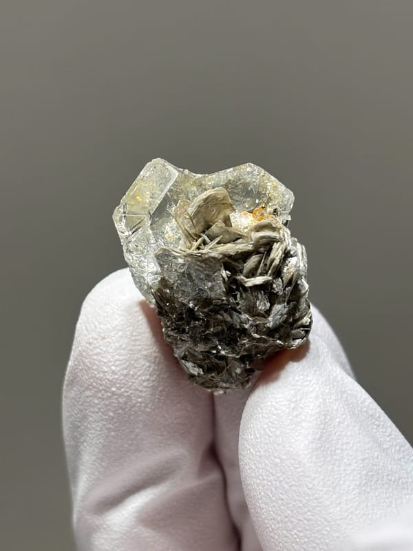 Glassy aquamarine on mica rosette from Xuebaoding, Sichuan, China, second angle