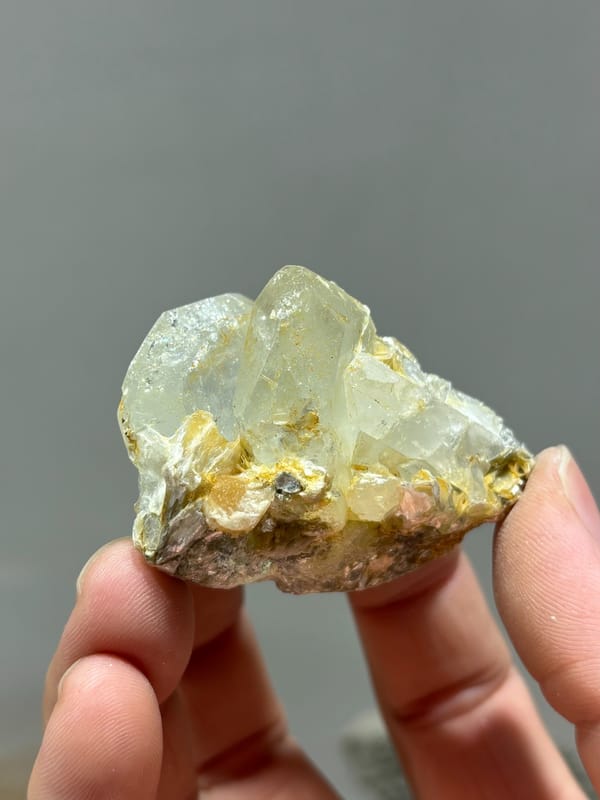 Glassy aquamarine group with mica and scheelite from Xuebaoding, Sichuan, China, second angle