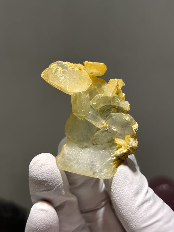 Multi-crystal aquamarine group with golden mica from Xuebaoding, Sichuan, China, second angle