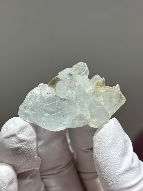 Multi-crystal clear aquamarine group from Xuebaoding, Sichuan, China, close-up of the crystal faces