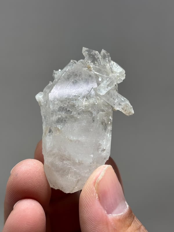 Multi-crystal etched quartz floater from Xuebaoding, Sichuan, China, second angle