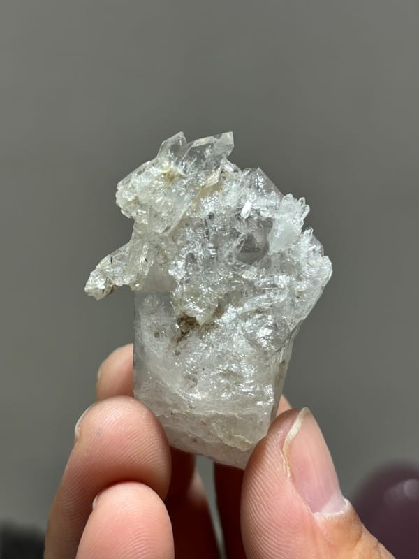 Multi-crystal etched quartz floater from Xuebaoding, Sichuan, China, reverse side