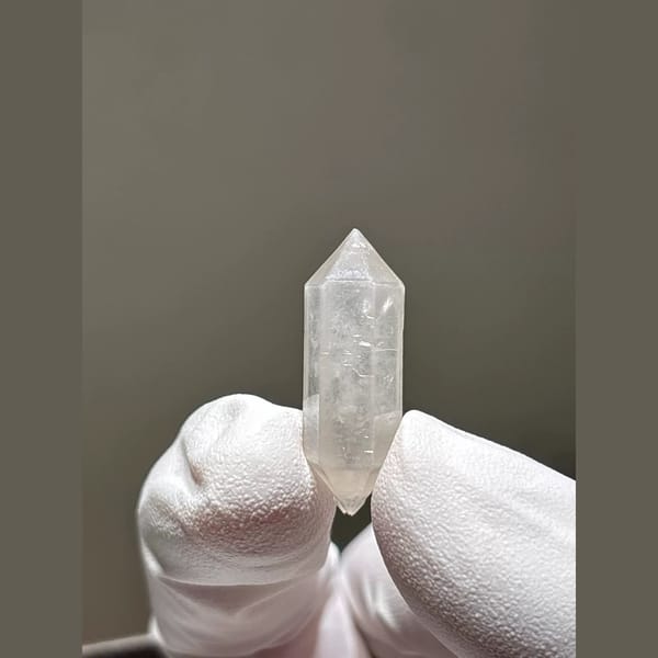 White double-terminated quartz crystal from Yunnan — detail view