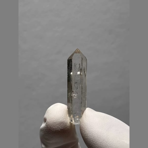 Slender Enhydro Quartz with Calcite from Yunnan, China — complete view