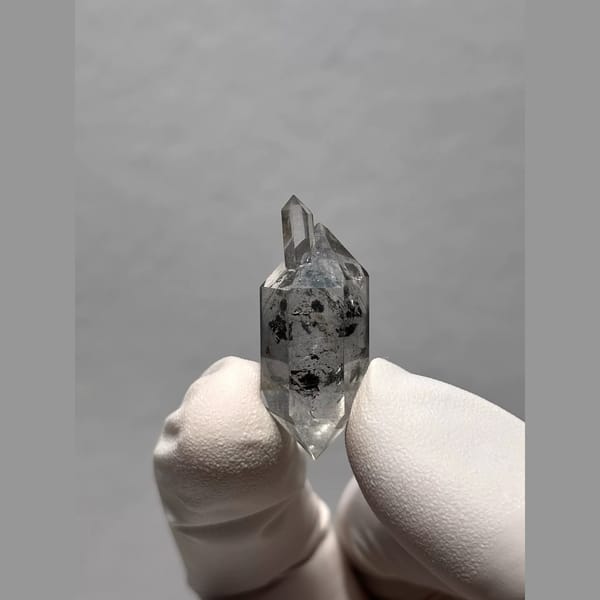 Sketch-Inclusion Double-Terminated Quartz from Yunnan, China — complete view