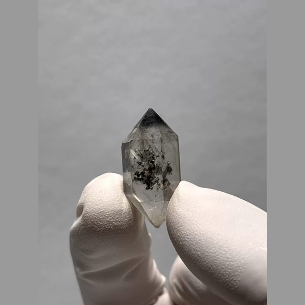 Sketch-Inclusion Double-Terminated Quartz from Yunnan, China — complete view