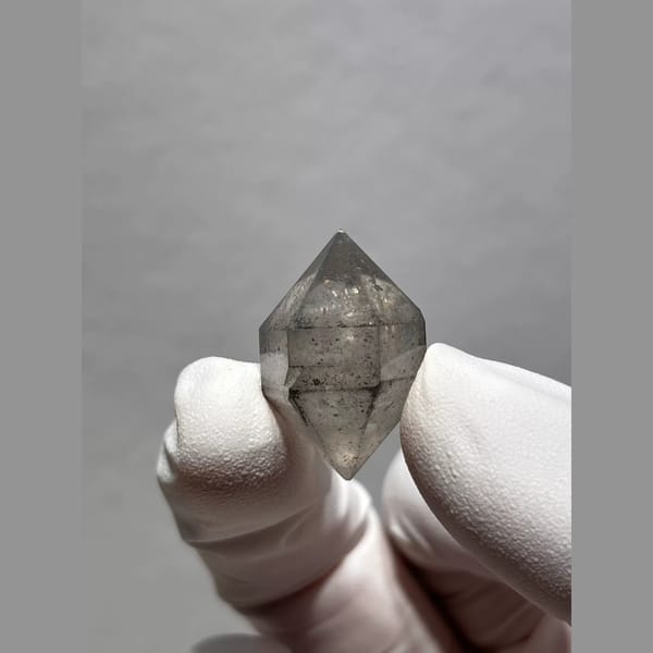 Sketch-Inclusion Double-Terminated Quartz from Yunnan, China — complete view