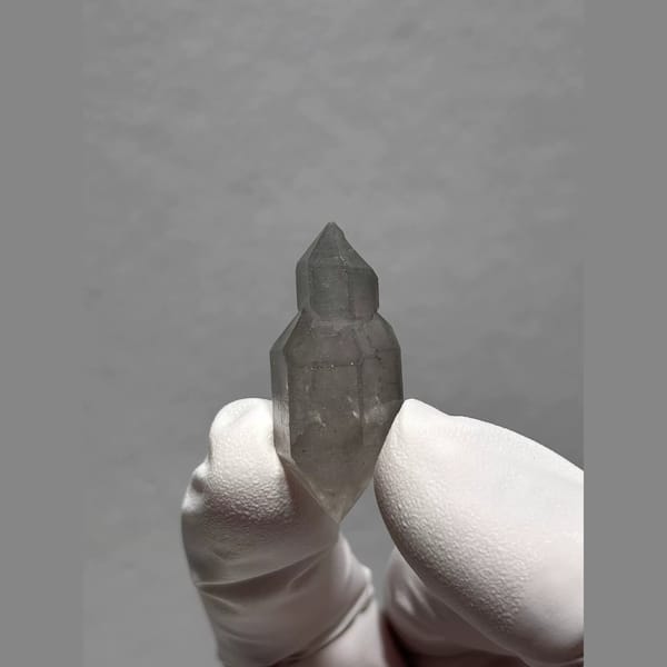 Sketch-Inclusion Double-Terminated Quartz from Yunnan, China — complete view