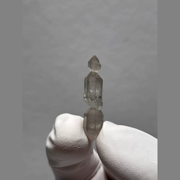 Sketch-Inclusion Double-Terminated Quartz from Yunnan, China — complete view