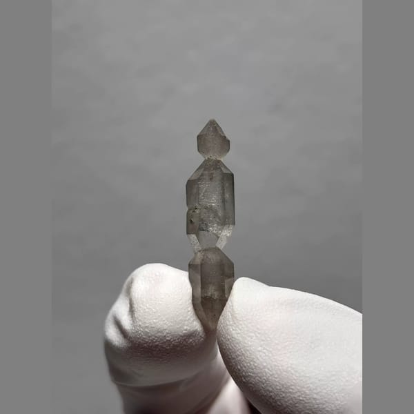 Sketch-Inclusion Double-Terminated Quartz from Yunnan, China — detail view