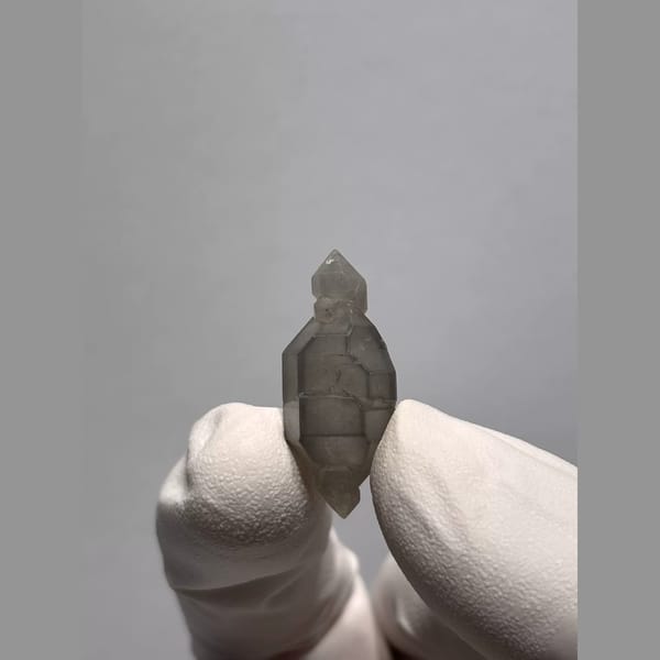 Sketch-Inclusion Double-Terminated Quartz from Yunnan, China — complete view