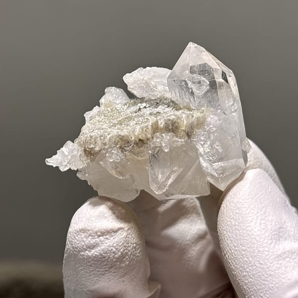 Clear quartz floater crystals with mica from Xuebaoding, Sichuan, China, natural mineral specimen, photo 1 of 5