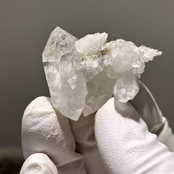Floater crystals of clear quartz with mica from Xuebaoding, one-of-a-kind specimen, photo 3 of 5