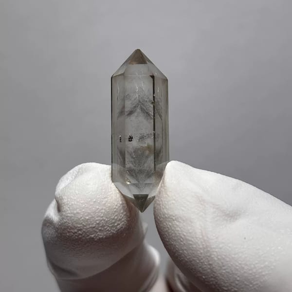 Double-terminated quartz crystal with inclusions from Yunnan — alternate view