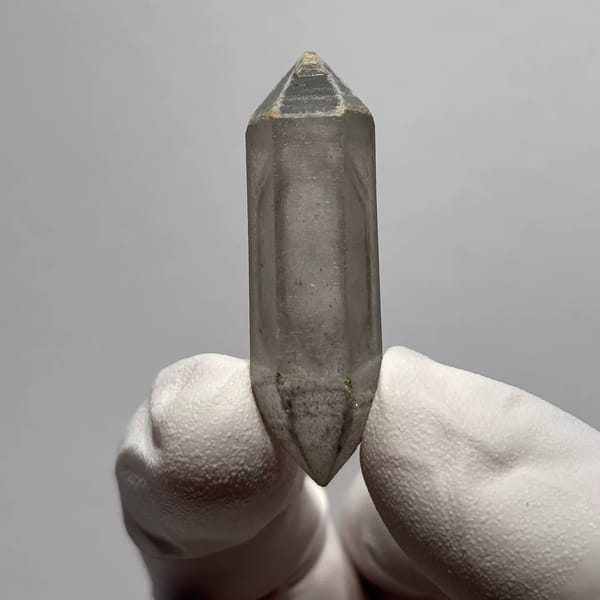 Complete double-terminated quartz crystal from Yunnan — alternate view