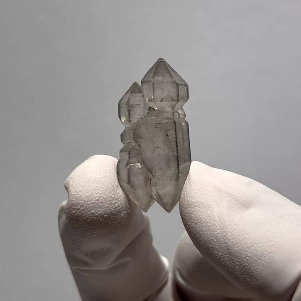 Yunnan quartz crystal with grey sketch-like inclusions — alternate view