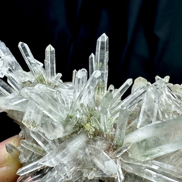 Radiating clear quartz needle cluster with green phantoms from Guangdong, China, second angle