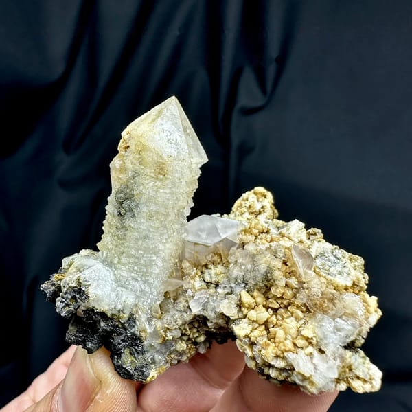Skeletal quartz point with green phantom on calcite and dolomite matrix from Inner Mongolia, China