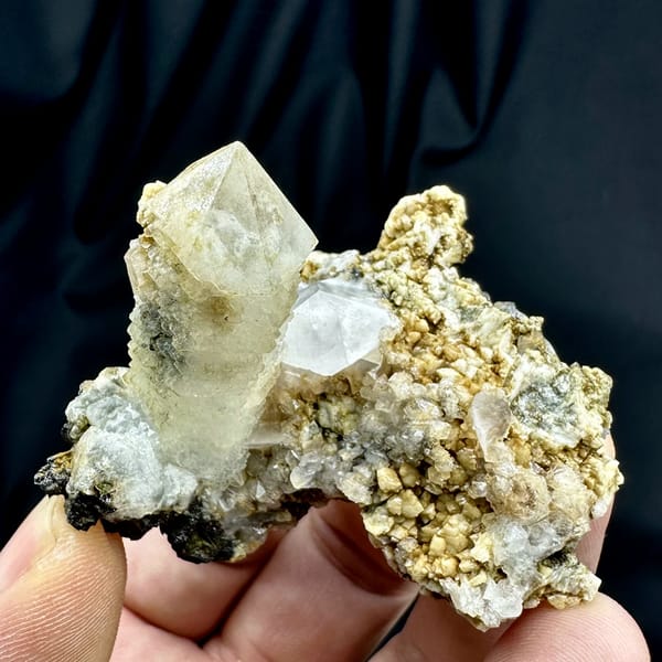Skeletal quartz point with green phantom on calcite and dolomite matrix from Inner Mongolia, China, top view