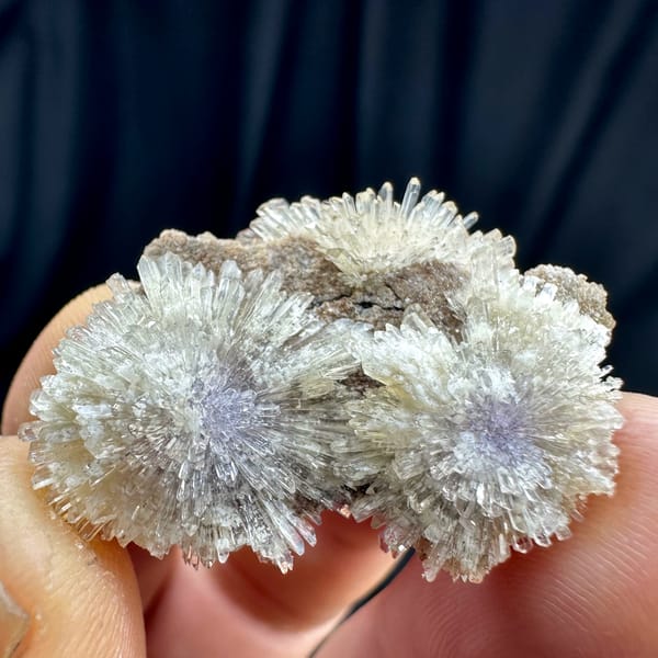 Purple-cored creedite needle sprays on matrix from Guizhou, China, top view