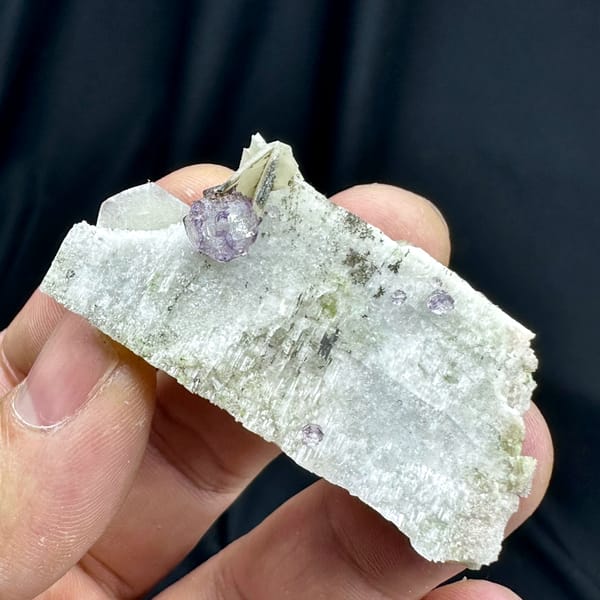 Small purple fluorite cube on pale feldspar floater from Yunxiao, Fujian, China, reverse side