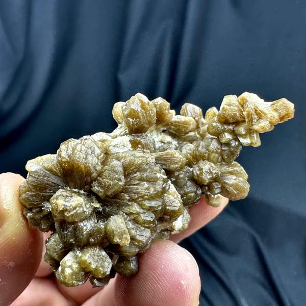 Golden-brown bow-tie stilbite crystal cluster from Yunxiao, Fujian, China, reverse side