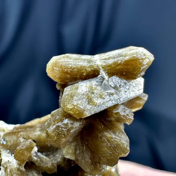 Golden-brown bow-tie stilbite crystal cluster from Yunxiao, Fujian, China, top view
