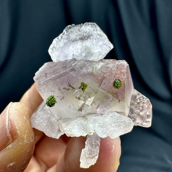 Lilac quartz floater with green epidote inclusions from Sichuan, China, second angle