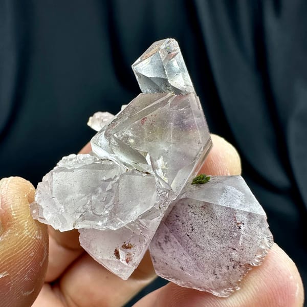 Lilac quartz floater with green epidote inclusions from Sichuan, China, reverse side