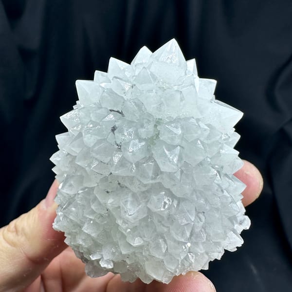 Dome of pale quartz points with green fluorite from Guangdong, China, top view