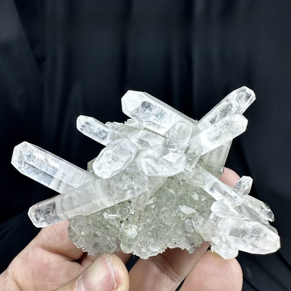 Crossed double-terminated calcite prisms with green fluorite and pyrite from Fujian, China, detail of the matrix contact