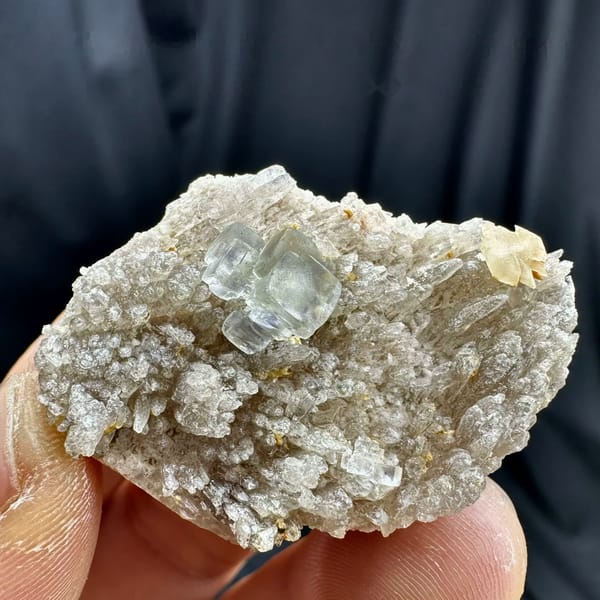 Pale blue-green stepped fluorite cube on feldspar matrix from Yunxiao, Fujian, China