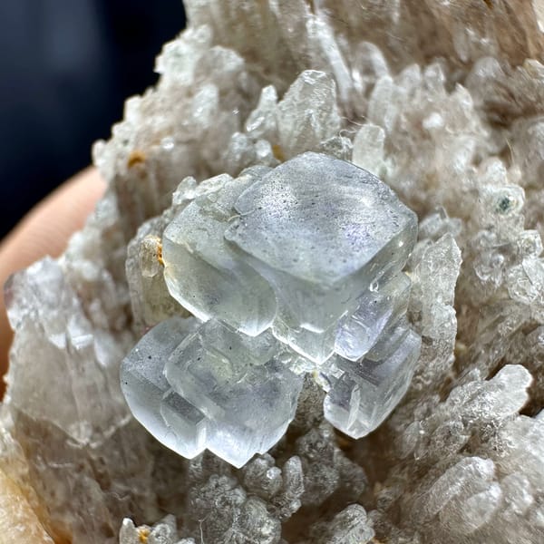 Pale blue-green stepped fluorite cube on feldspar matrix from Yunxiao, Fujian, China, second angle
