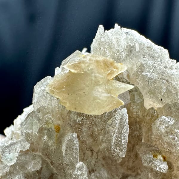 Pale blue-green stepped fluorite cube on feldspar matrix from Yunxiao, Fujian, China, top view