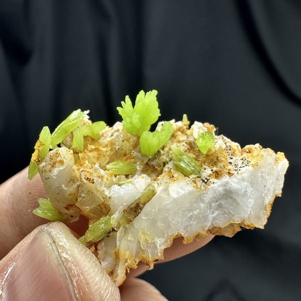Lime-green pyromorphite tufts on white quartz matrix from Guangxi, China, detail of the matrix contact
