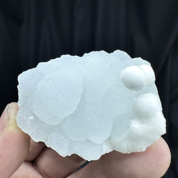 Powder-blue botryoidal aragonite with white aragonite from Yunnan, China, detail of the matrix contact