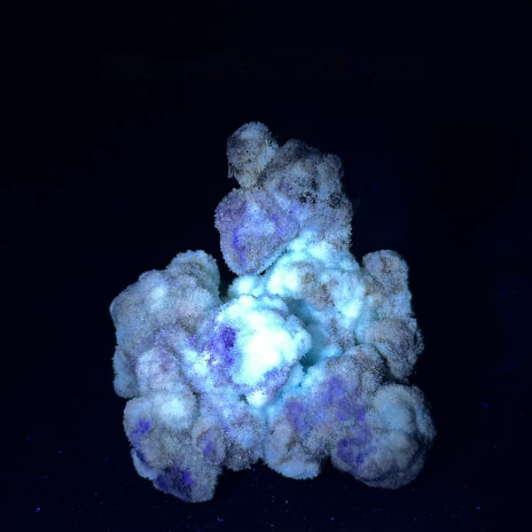 Blue-grey botryoidal creedite floater from Guizhou, China, top view