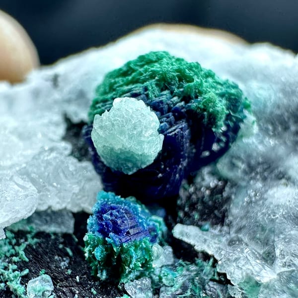 Malachite rosette with azurite on white calcite from Morocco, second angle