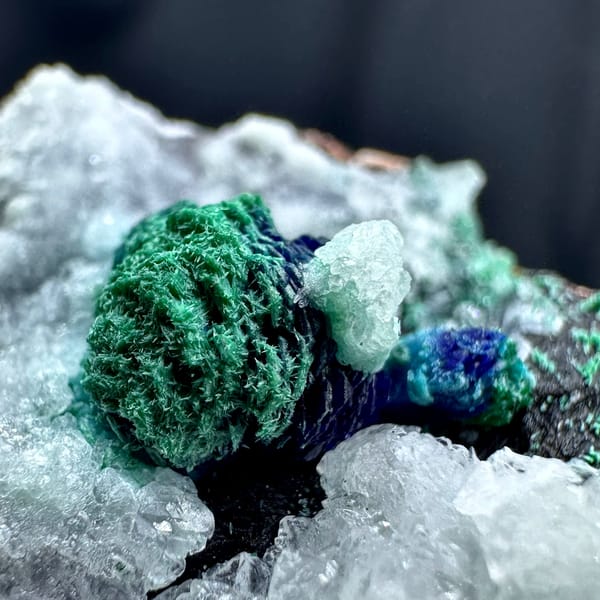Malachite rosette with azurite on white calcite from Morocco, top view