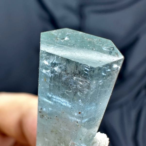 Pale blue double-terminated aquamarine crystal with dolomite from Namibia, second angle