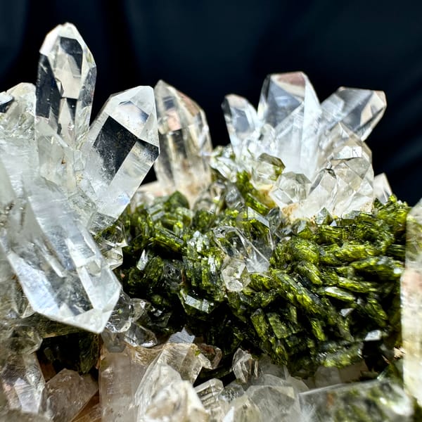 Transparent quartz cluster with green epidote from Sichuan, China, reverse side
