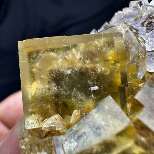 Honey-yellow fluorite cubes with blue cores and baryte from Beijing, China, top view