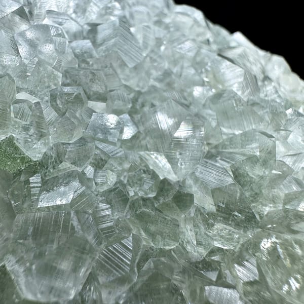Large pale green sugar-textured fluorite floater with calcite from Fujian, China, top view