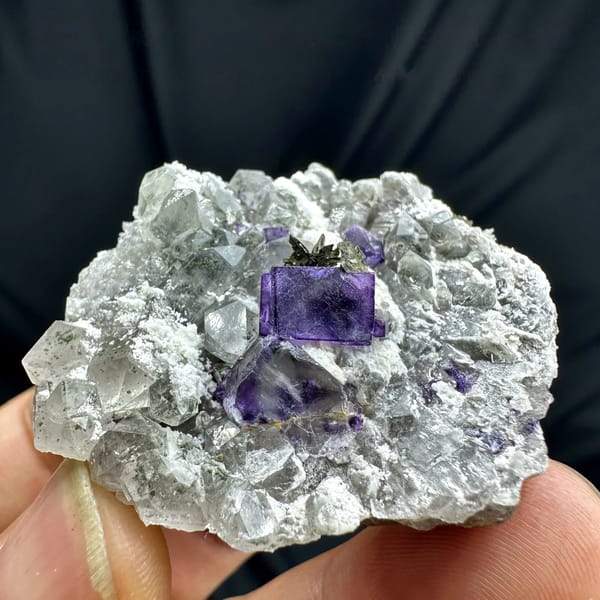 Deep purple fluorite cube on quartz with pyrrhotite from Yaogangxian Mine, Hunan, China