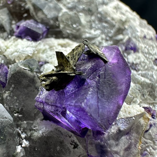 Deep purple fluorite cube on quartz with pyrrhotite from Yaogangxian Mine, Hunan, China, reverse side
