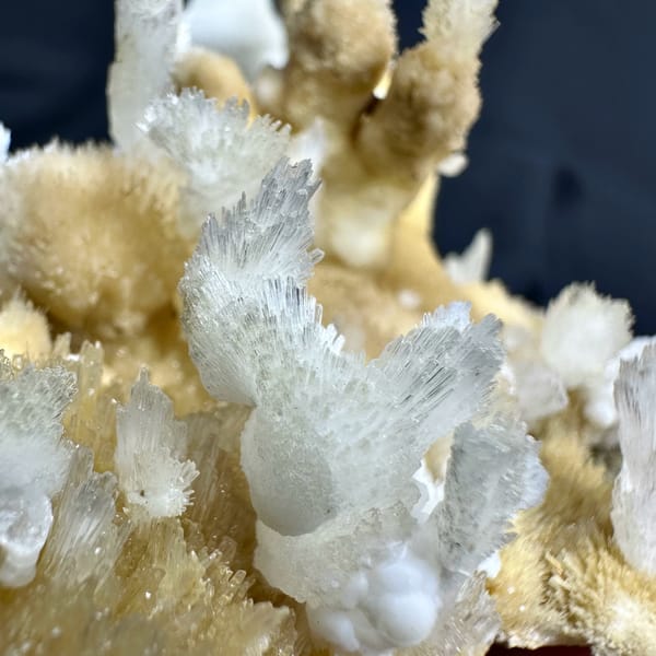 White aragonite spires on golden aragonite base from Guizhou, China, second angle