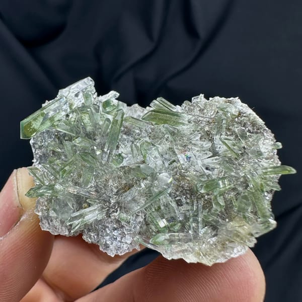 Green phantom quartz needle cluster from Sichuan, China, reverse side