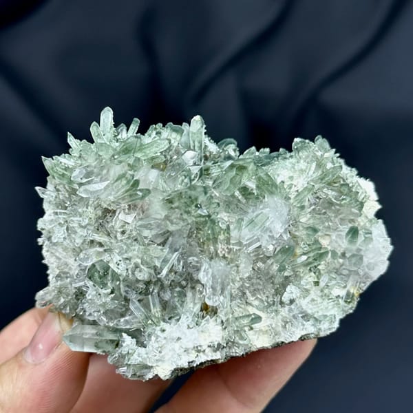 Cluster of green phantom quartz points from Sichuan, China, second angle